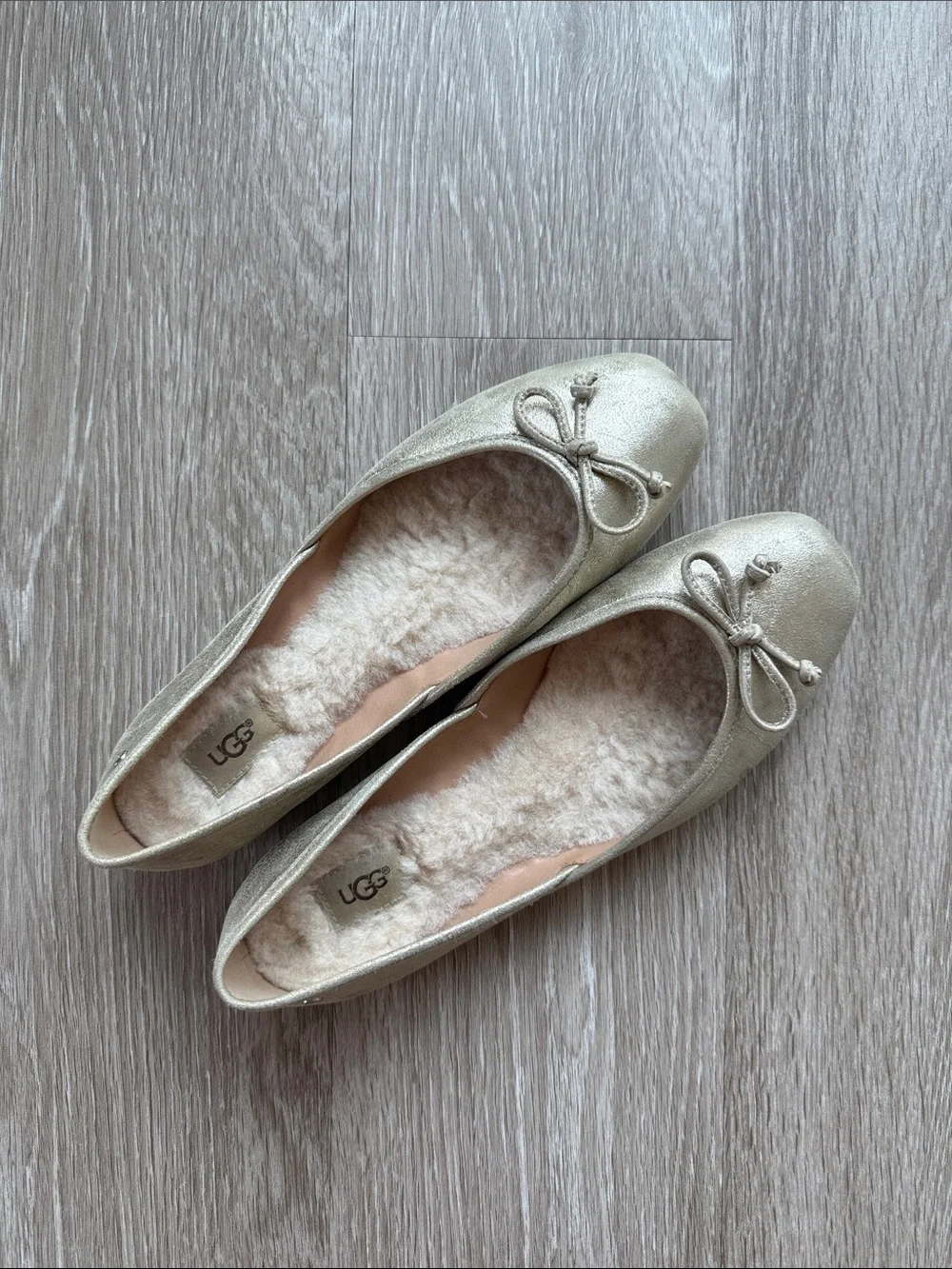 UGG Metallic Gold Shearling Ballet Flats with Bow